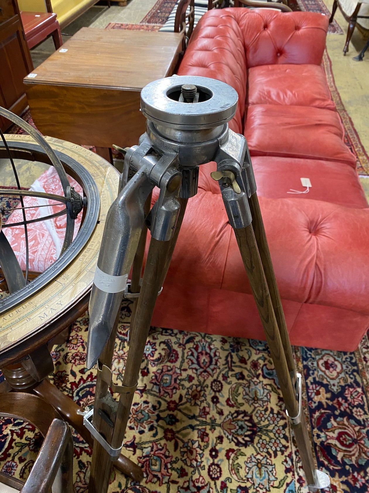 An industrial style telescopic tripod stand